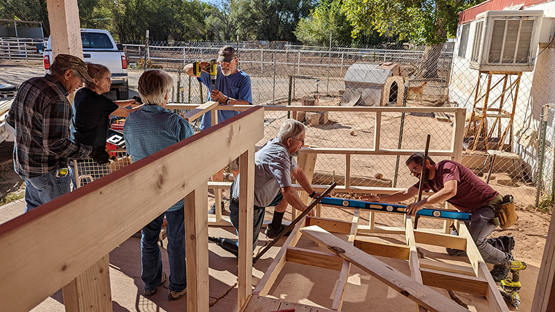 Volunteers building a ramp